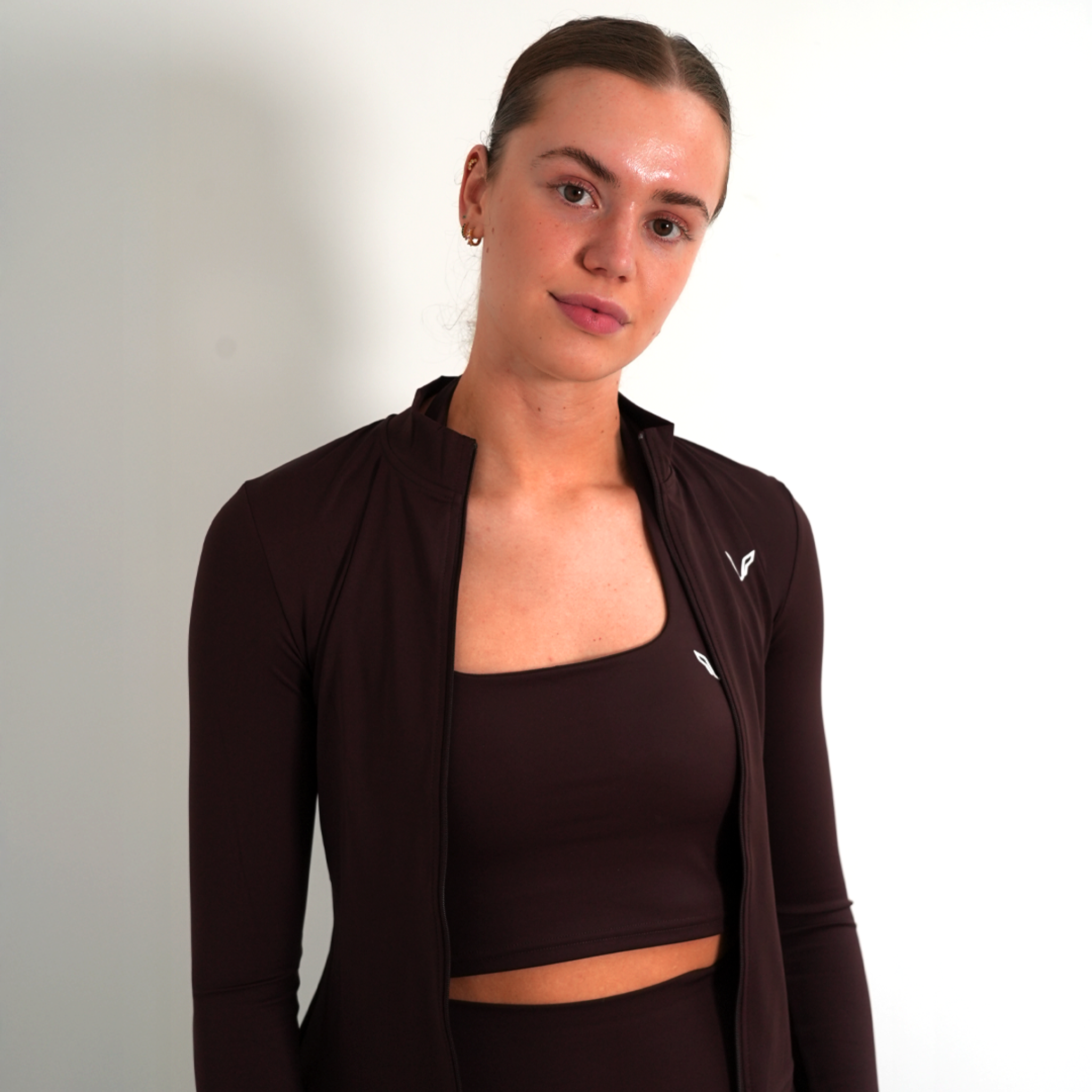 SECTION ØNE | PERFORMANCE TOP BROWN